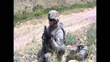 Specialist Mark D Talks to Bob Calvert in Afghanistan