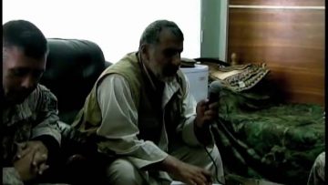 Vermont National Guard Major Clayton Gardner and Afghan National Army Commander COL Rajab Khan