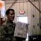 Watch 2LT Smith and MSGT Sayama Turner in Mail Center picking up Care Packages