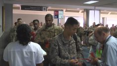 Watch Re-Deploying Troops Boarding Plane heading for DFW Airport