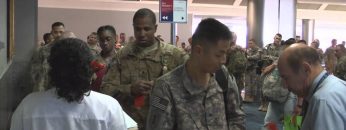 Watch Re-Deploying Troops Boarding Plane heading for DFW Airport